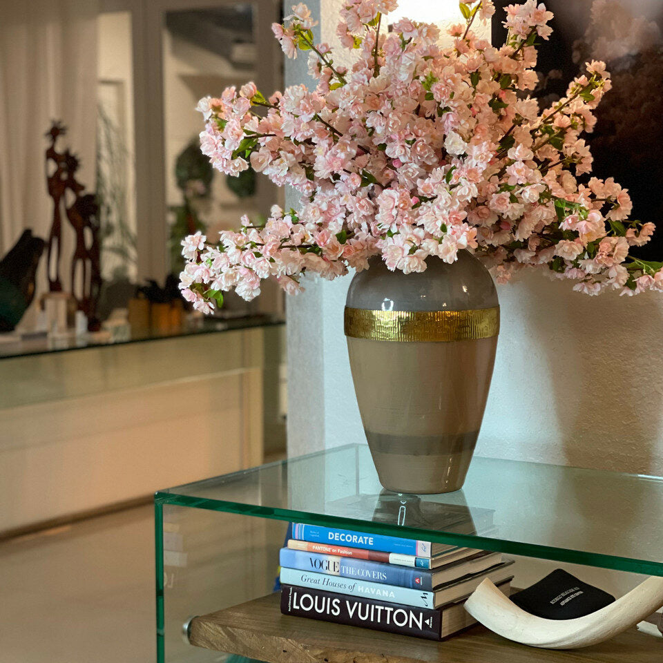 'Goddess' vase with pink cherry blossoms